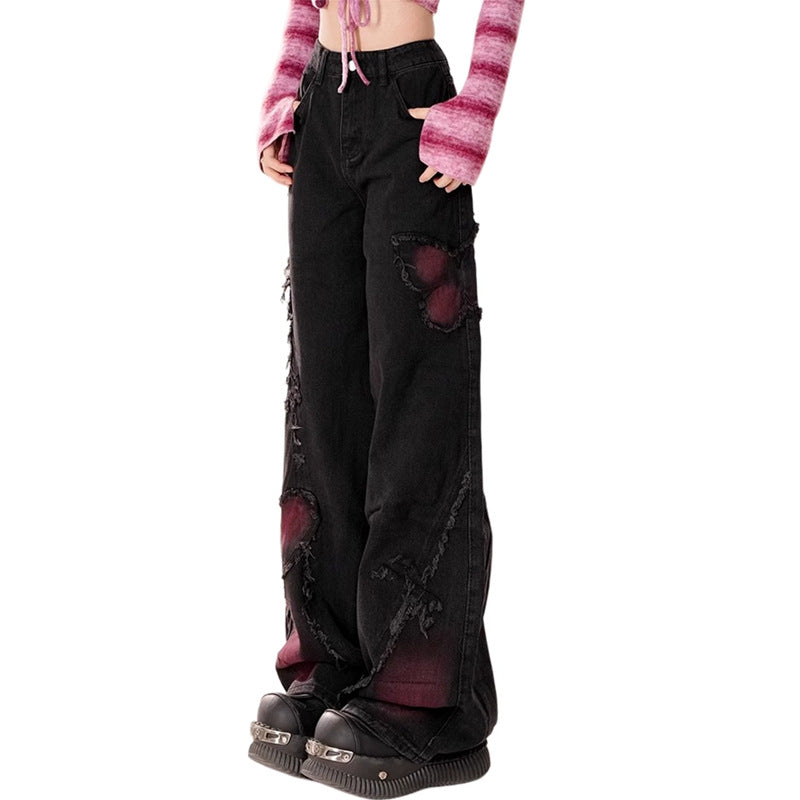Washed distressed wide leg pants with butterfly pattern
