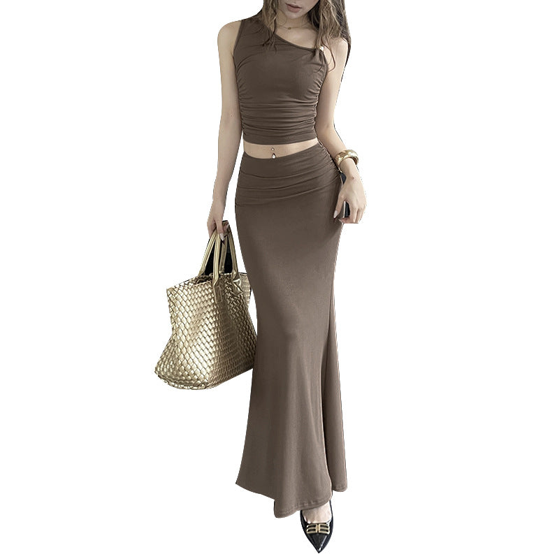Asymmetric sloping shoulder top pleated hip hugging long skirt set for women